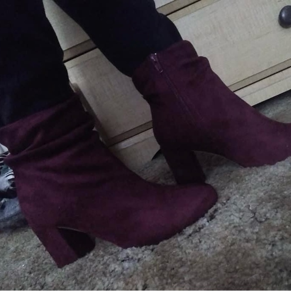 Burgundy zip up ankle boots. Never worn.
